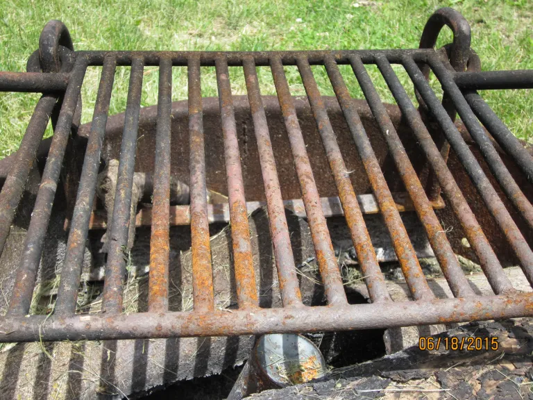 outdoor grill with a rusty grate