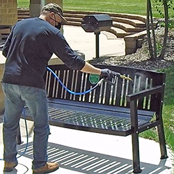 DMS-TNT350 Disinfecting Mister used on Park Bench.
